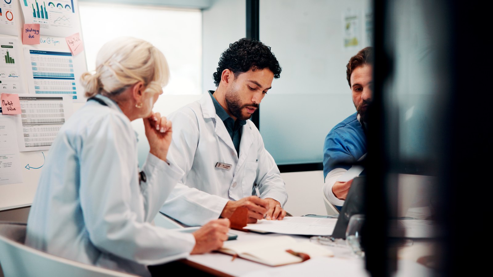 tilt-billing-success-cbx71347071 Practice leadership team discussing results in a meeting